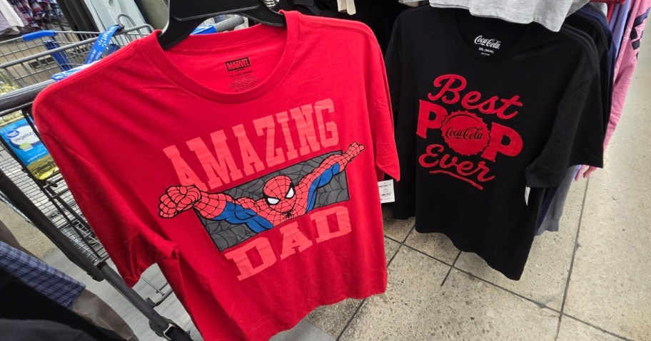 a Spiderman Father's Day Tee next to a Best Pops Ever Tee in Walmart