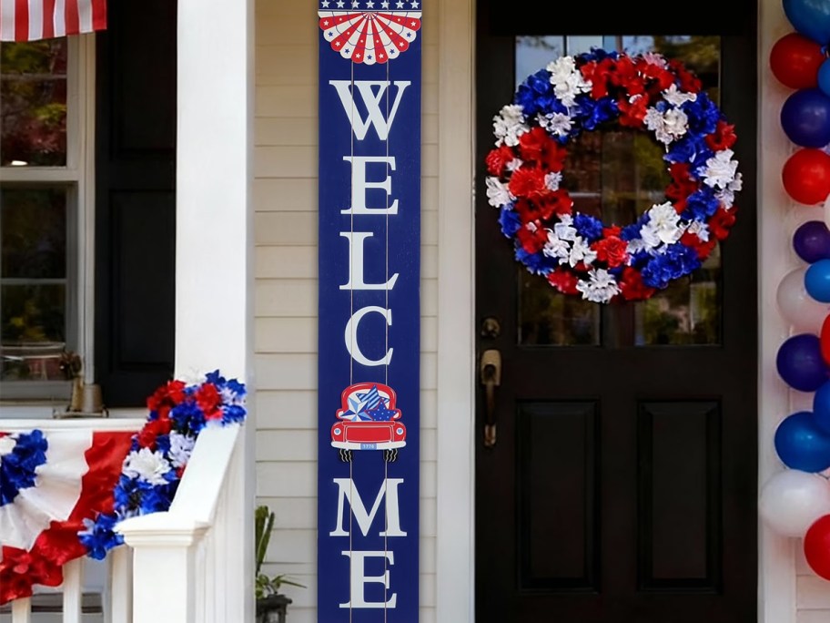 blue welcome porch sign on porch 