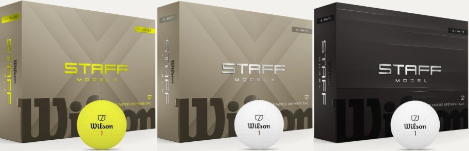 three boxes of golf balls