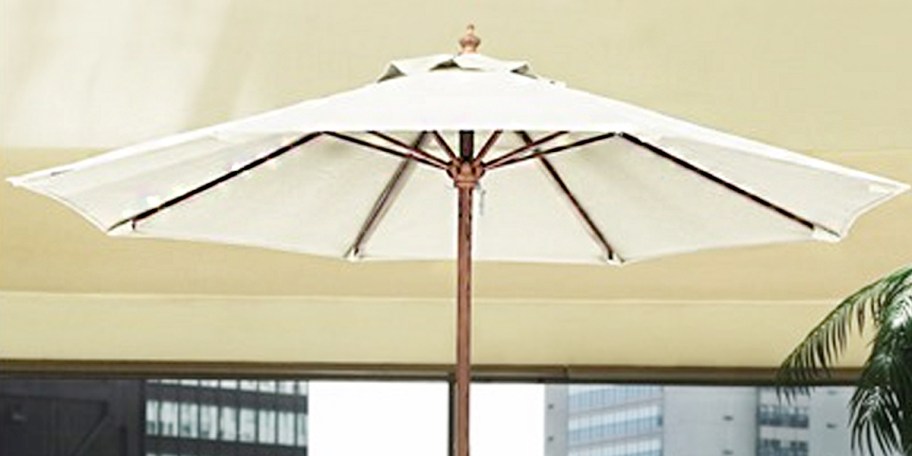 tan patio umbrella opened 