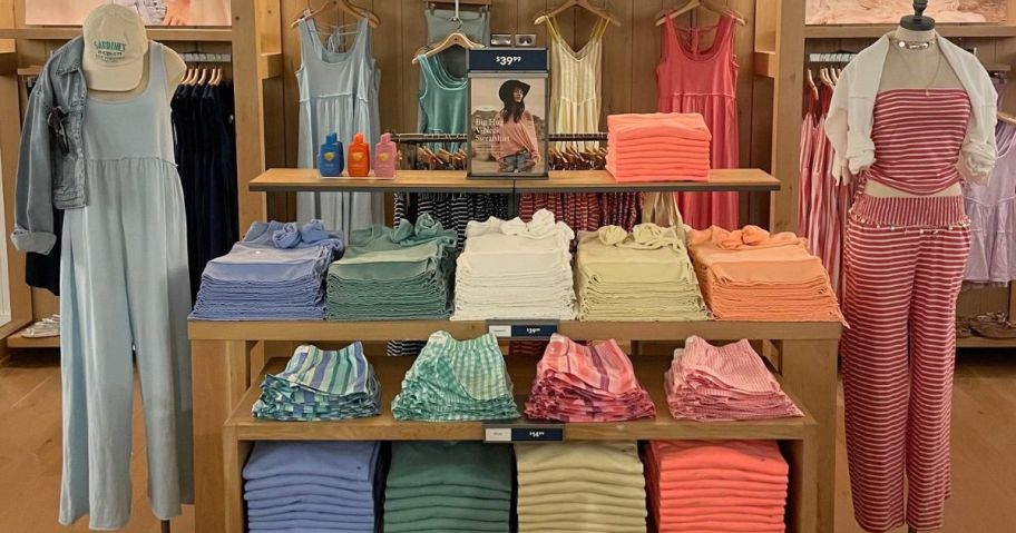 American Eagle Tees and Jumpsuits on display at a store