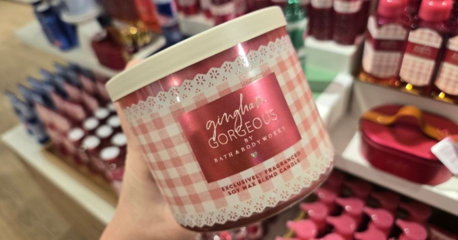 Hand holding a Gingham Gorgeous Bath & Body Works 3-Wick Candle
