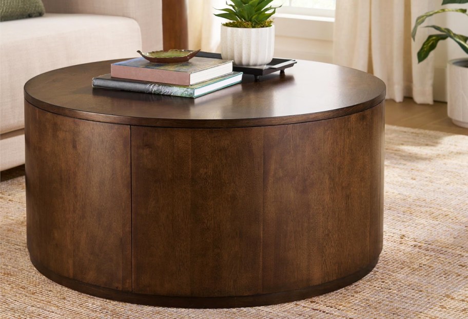 round wood coffee table in a living room