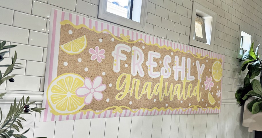 graduation photo banner on wall