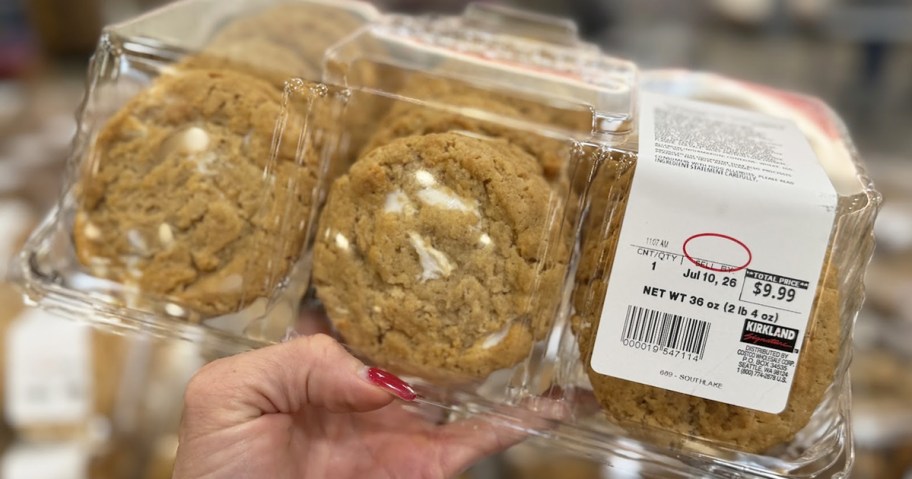hand holding up a pack of marshmallow cookies