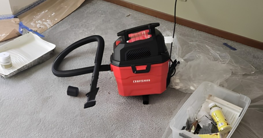 Craftsman 3-Gallon Wet/Dry Shop Vacuum on carpet with paint supplies