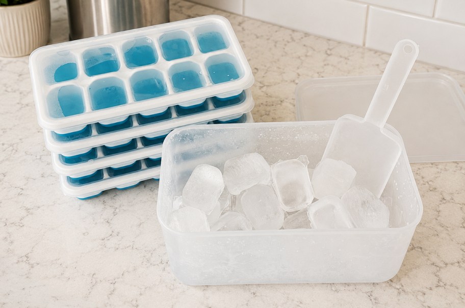 Ice cube trays and bucket on a kitchen counter