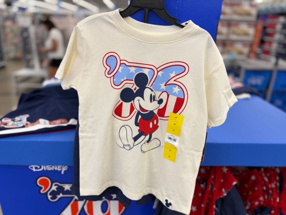 A Disney Americana Mickey T-Shirt on a hanger