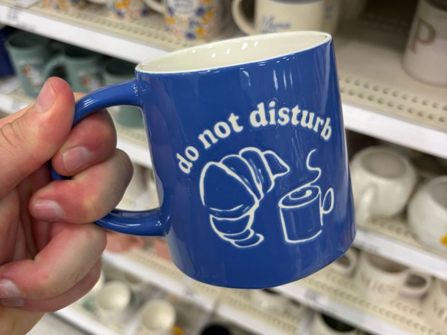 Do Not Disturb Mug in hand in store