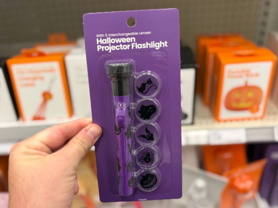 GEMS Halloween Flashlight in hand in store