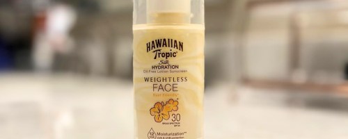 bottle of hawaiian tropic weightless face sunscreen on bathroom counter