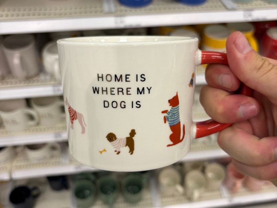 Home Is Where My Dog Is Mug in hand in store
