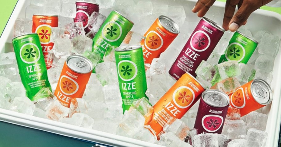 colorful cans of IZZE Sparkling Fruit Juice on ice in a cooler