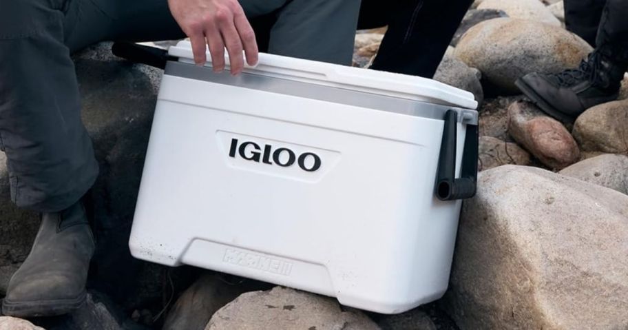 Fishing men with an Igloo Hard marine cooler