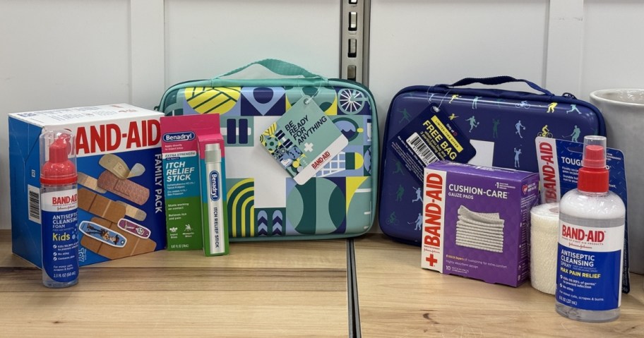 johnson & johnson first aid kit bags on store shelf with band-aid and benadryl products in front