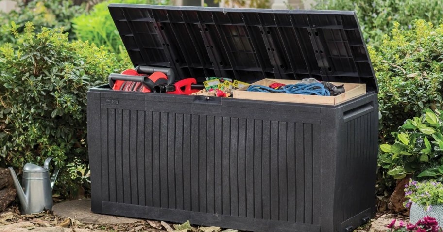 outdoor gear inside of a large black deck box