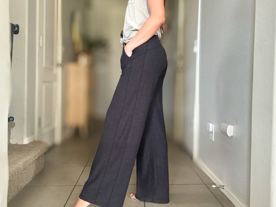 a woman in a pair of wide leg pants