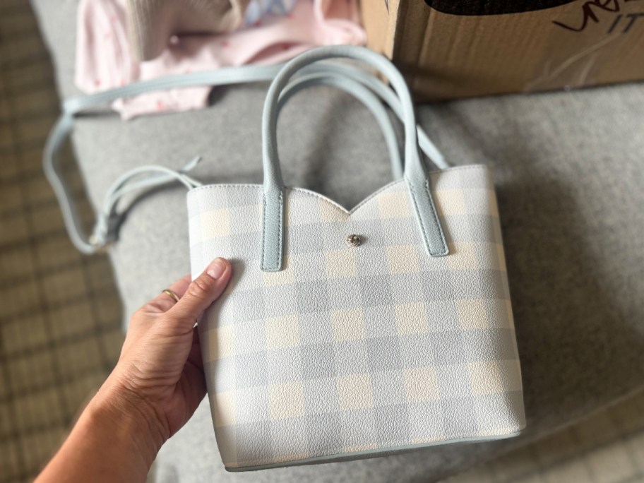 a blue gingham crossbody mini bag