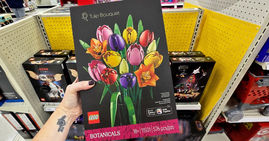hand holding up LEGO Botanicals Tulip Bouquet box in store