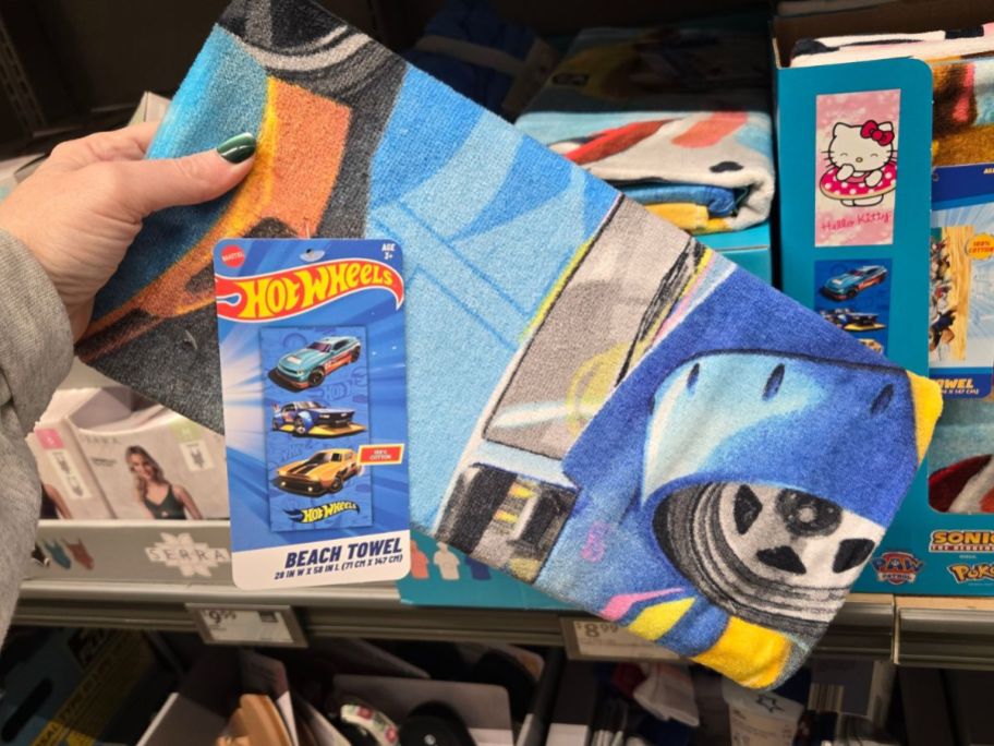 hot wheels beach towel in hand in store