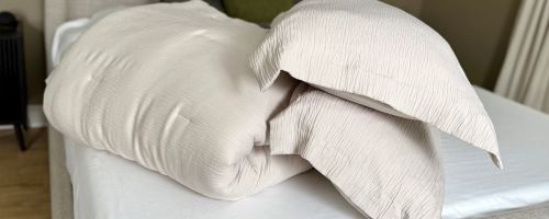 A Linens & Hutch Cloud Weave Comfter and two shams