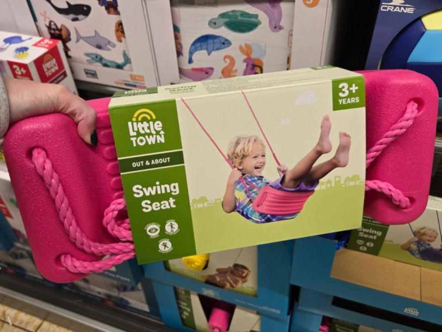 Little Town Swing Seat in hand in store