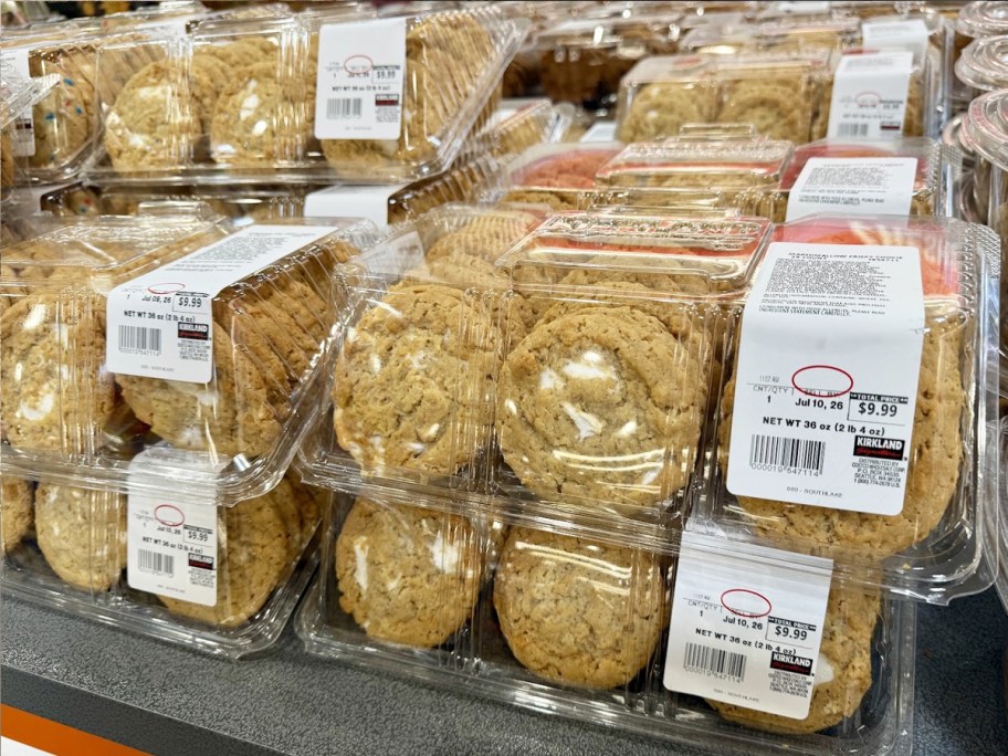 packs of cookies stacked on display table
