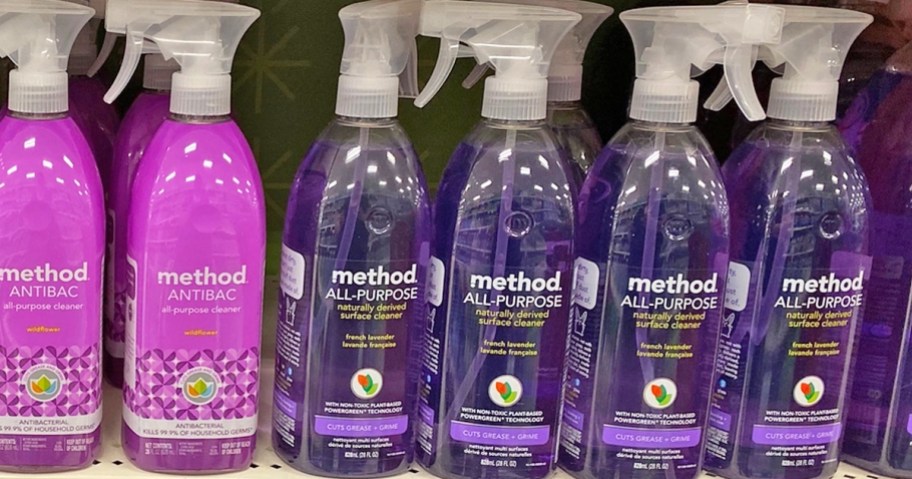 purple bottles of Method All-Purpose Cleaner Spray in a row on store shelf