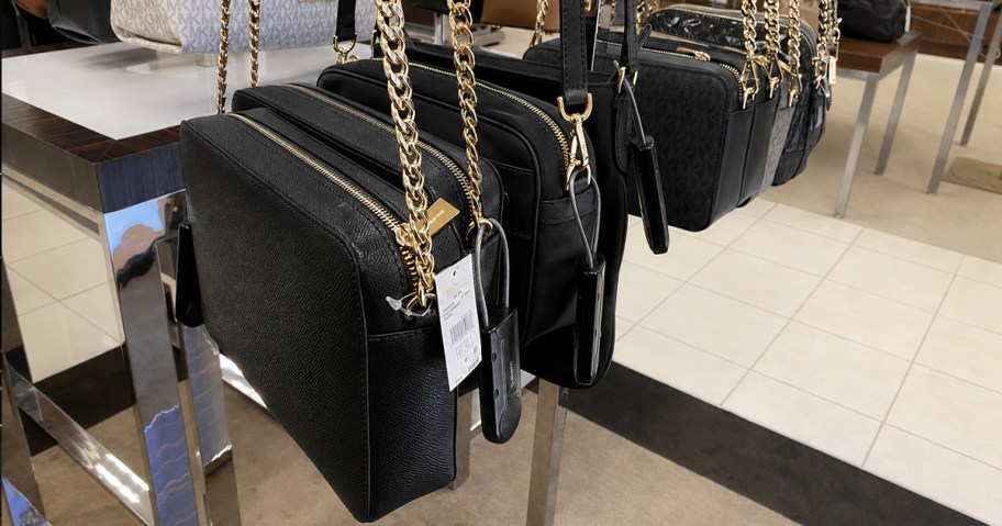 black crossbody bags on display in store
