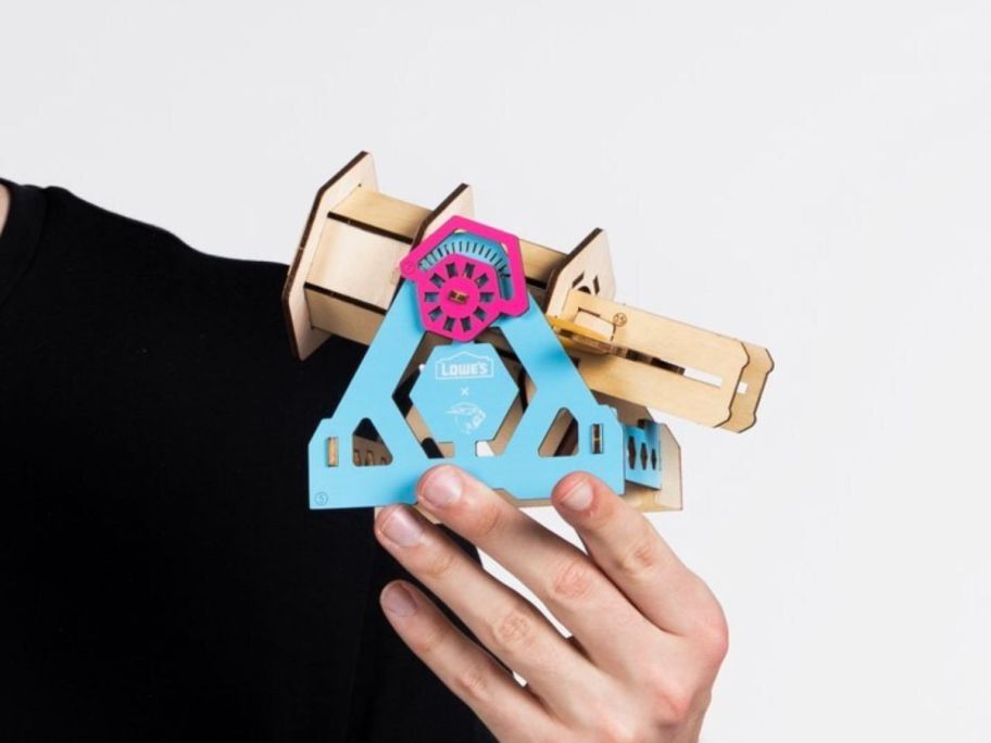 MrBeast holding MrBeast Swarm Launcher