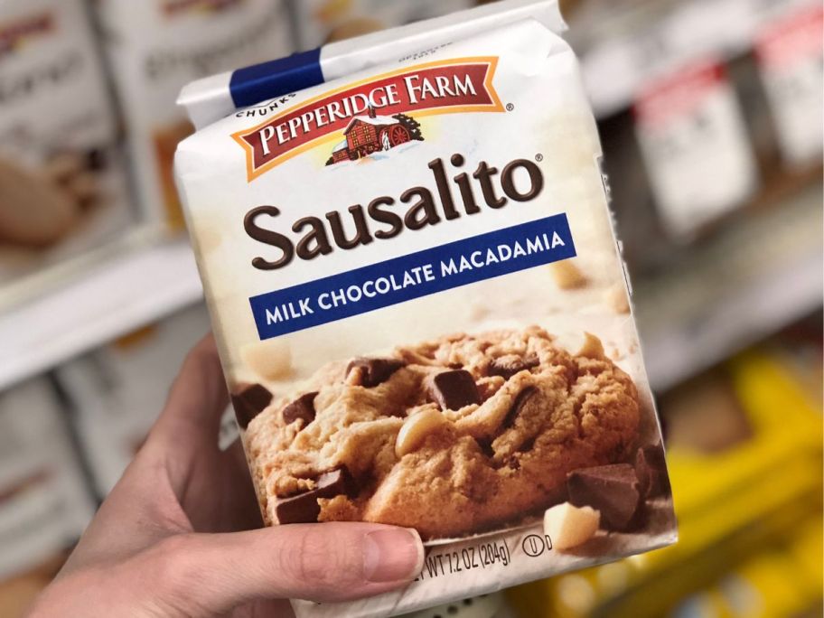 hand holding a bag of Sausalito Cookies