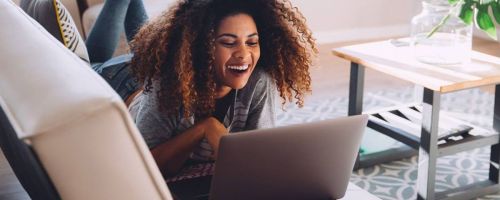 woman using T-Mobile 5G Home Internet on laptop