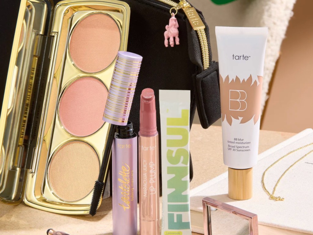 @itsmaureenkelly Custom Kit filled with tarte makeup products, and a bag charm