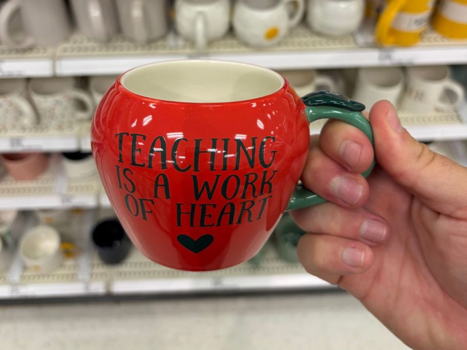 Teaching Is A Work of Heart Mug in hand in store