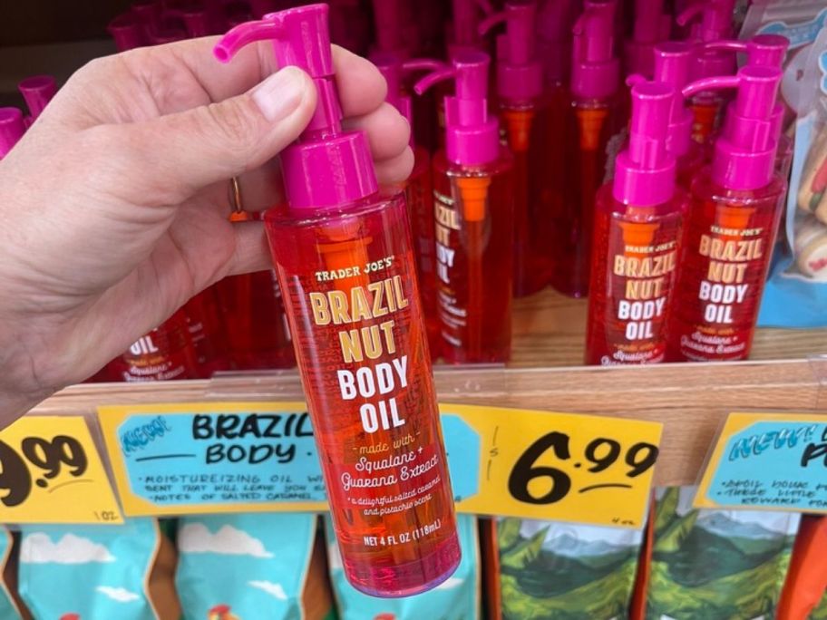 Trader Joe's Brazil Nut Body Oil in hand in store