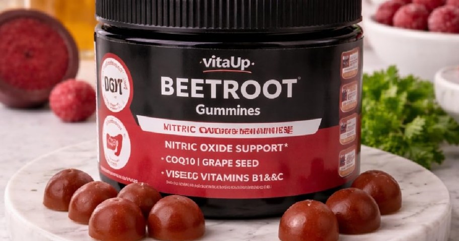 A jar of beetroot gummies on a marble surface, surrounded by whole cherries and parsley. The label highlights nitric oxide support and vitamins.