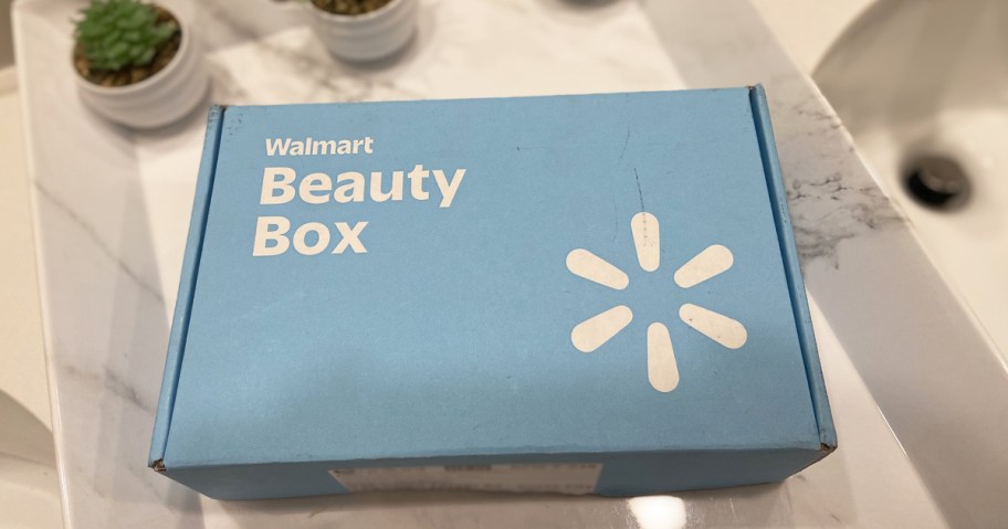 blue and white Walmart Beauty Box on counter