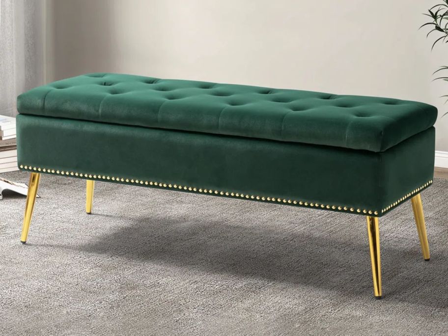 A green The Twillery Co. Kajana Transitional Velvet Upholstered Flip-Top Storage Bench