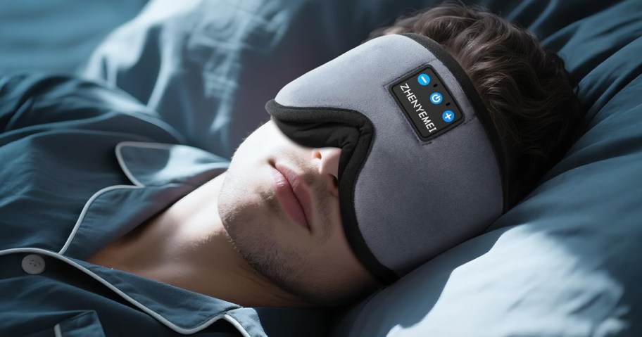 man wearing a sleep mask
