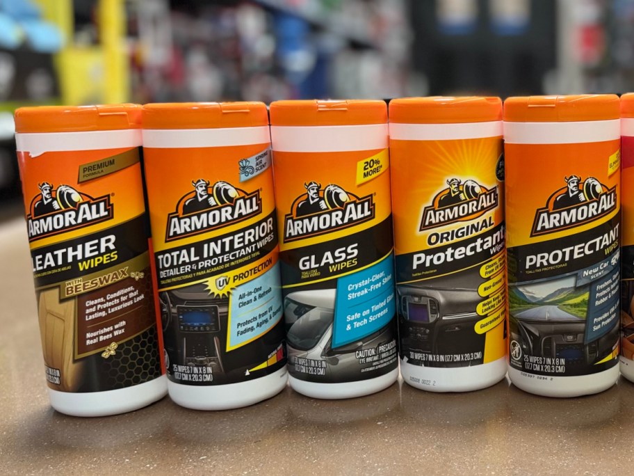 row of armor all wipes lined up on a floor
