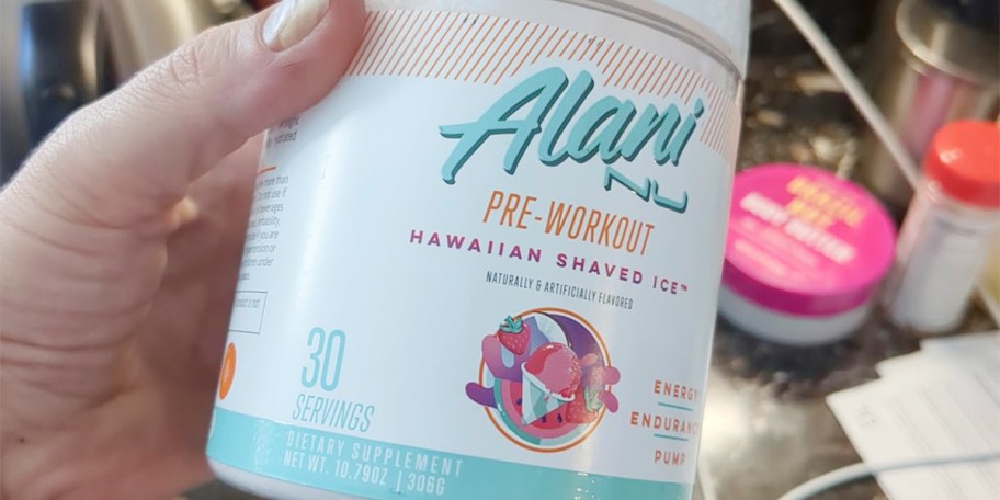 hand holding alani prework out container
