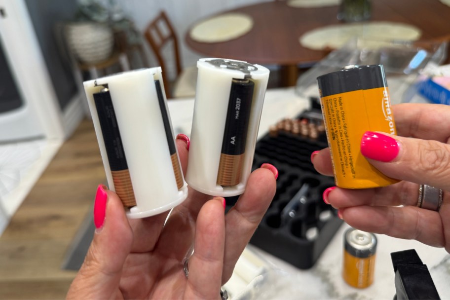 hand holding battery pack adapter
