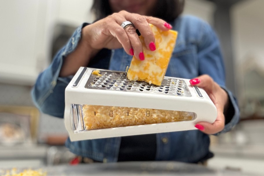 white cheese grater with container on bottom