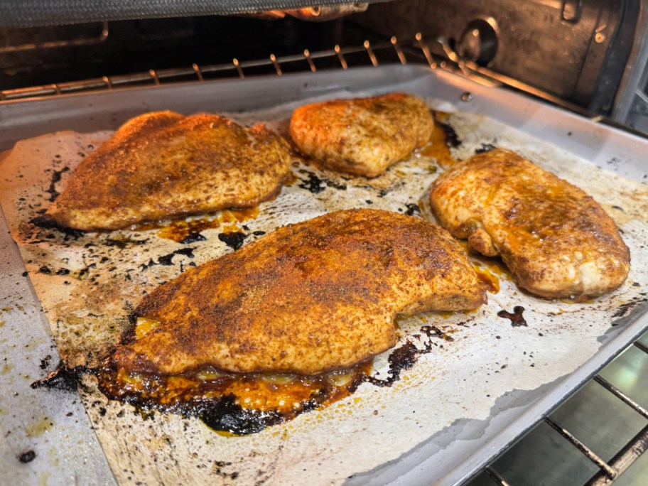 baked chicken breasts on a sheet pan in the oven (1)