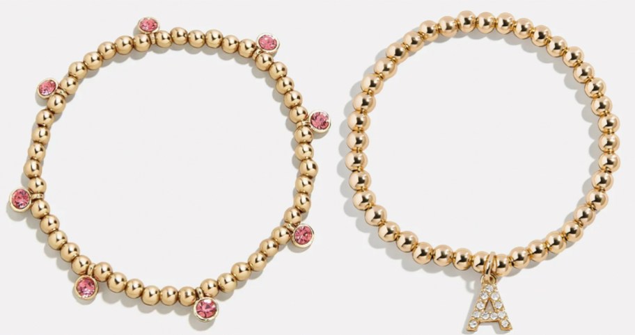 two gold bracelets