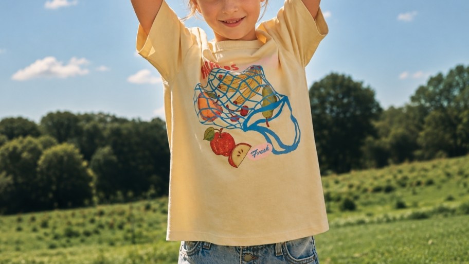 a girl in a graphic tee
