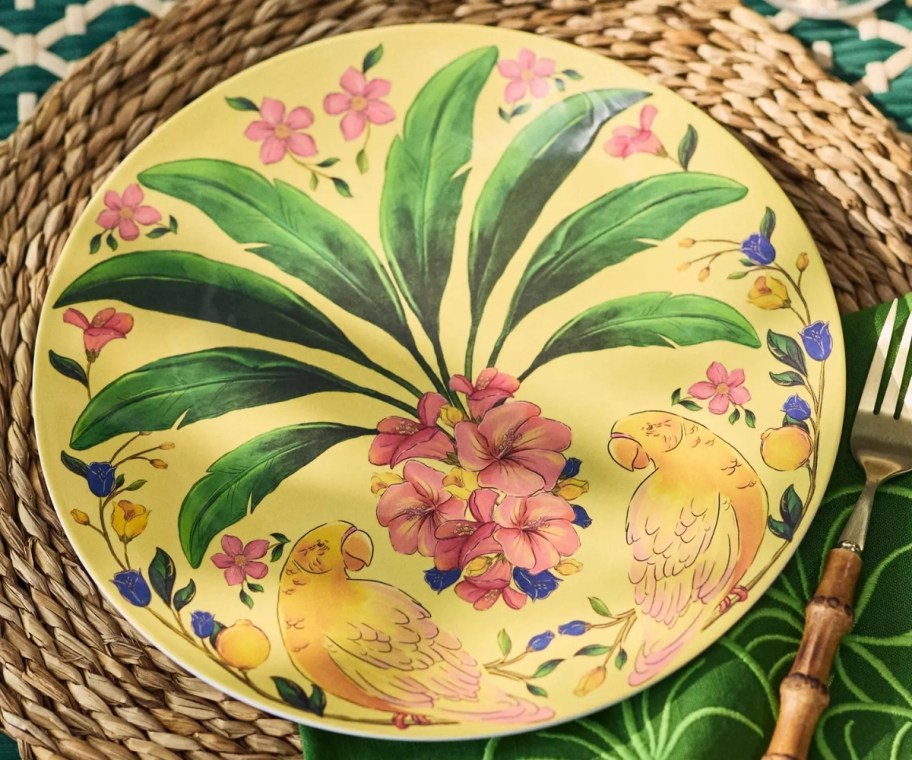 a yellow dinner plate with palm frond design