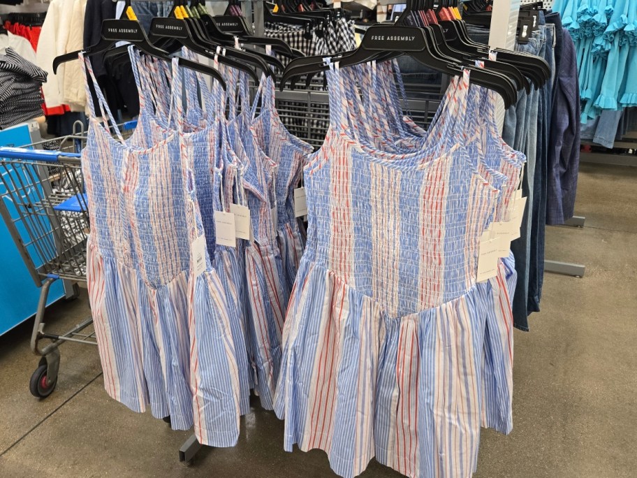 striped dresses hanging on rack at Walmart