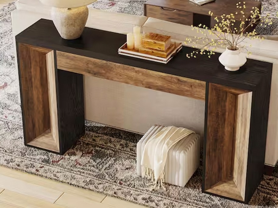 black and wood entryway table