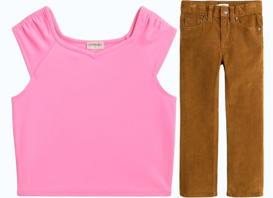 a girl pink top and boys corduroy pants